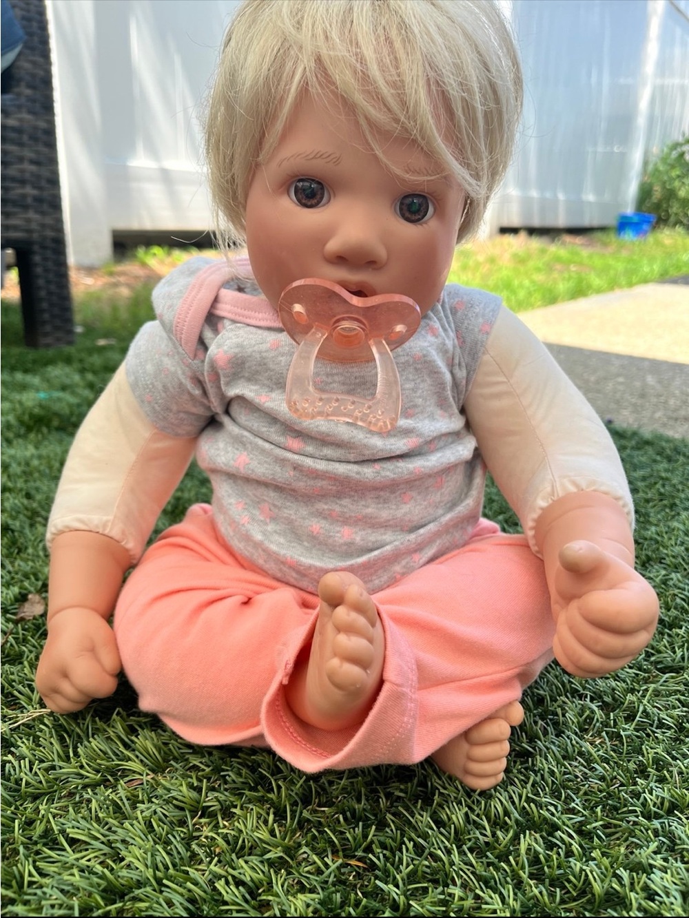 Cuddly Baby Doll with Pink Pacifier and Coral Outfit